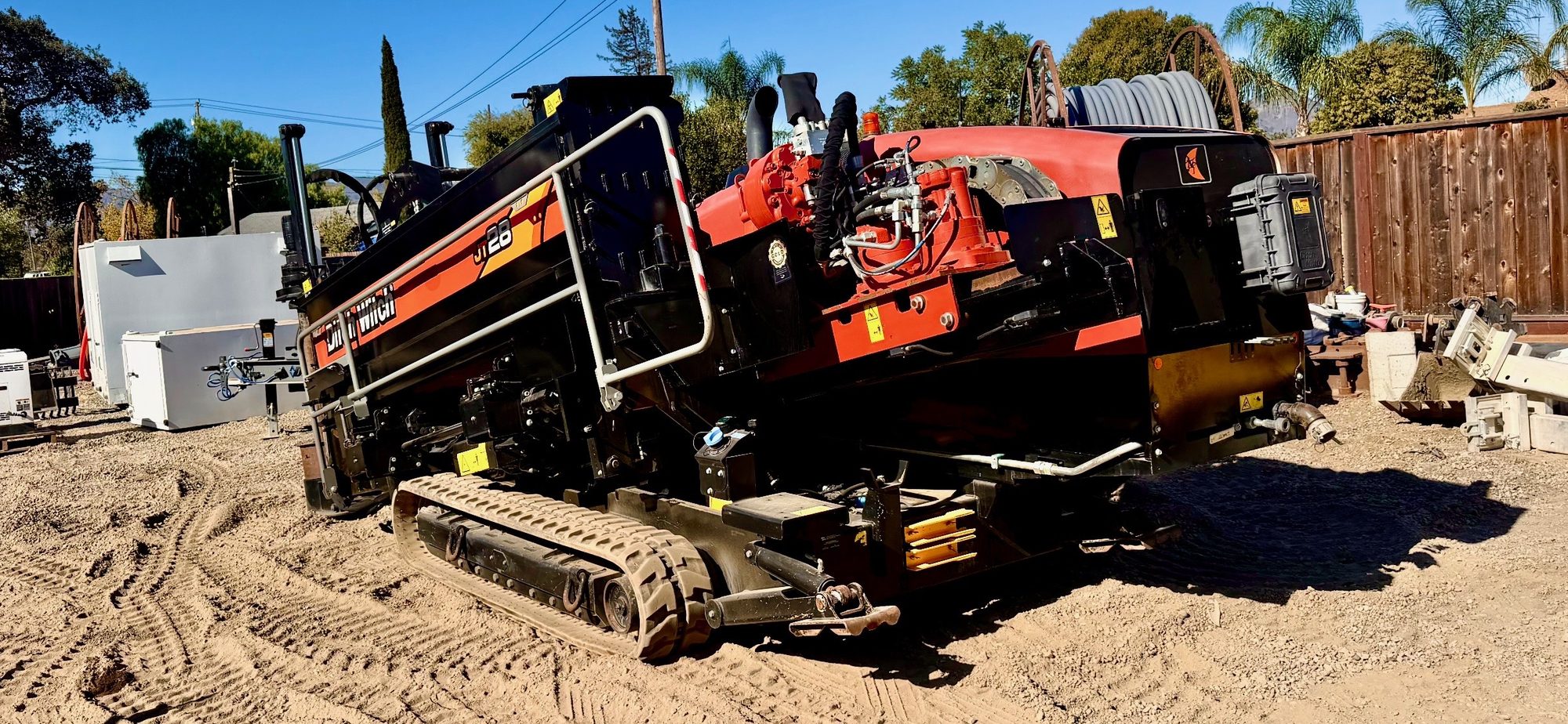 DrillSky's 2021 Ditch Witch JT28 directional drill on tracks in the yard